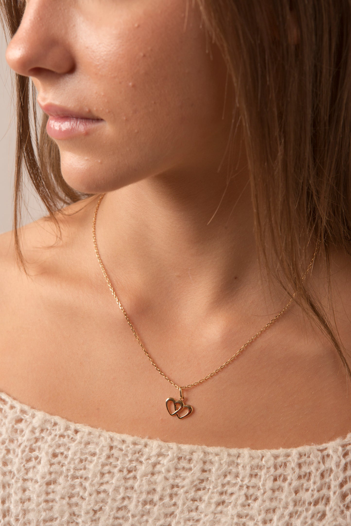 collier plaqué or avec pendentif double coeur