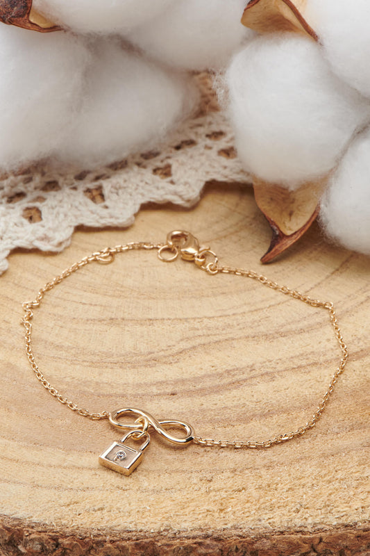 Bracelet plaqué or avec cadenas et motif infini