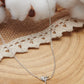 collier argent motif bouquet