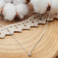 Collier en argent avec un pendentif oxyde de zirconium griffé