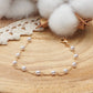 bracelet plaqué or orné de perles